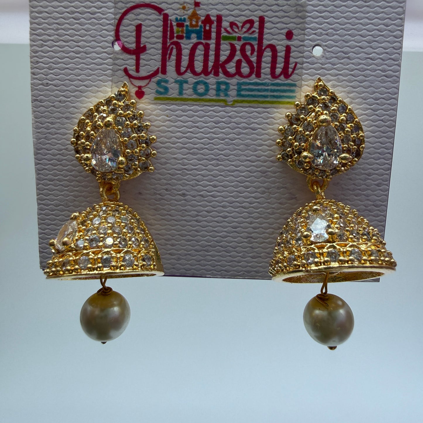 Gold Crystal Jhumka Earrings with Pearl Drop – Elegant Party Wear Jewellery