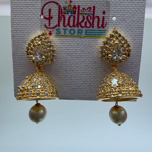 Gold Crystal Jhumka Earrings with Pearl Drop – Elegant Party Wear Jewellery