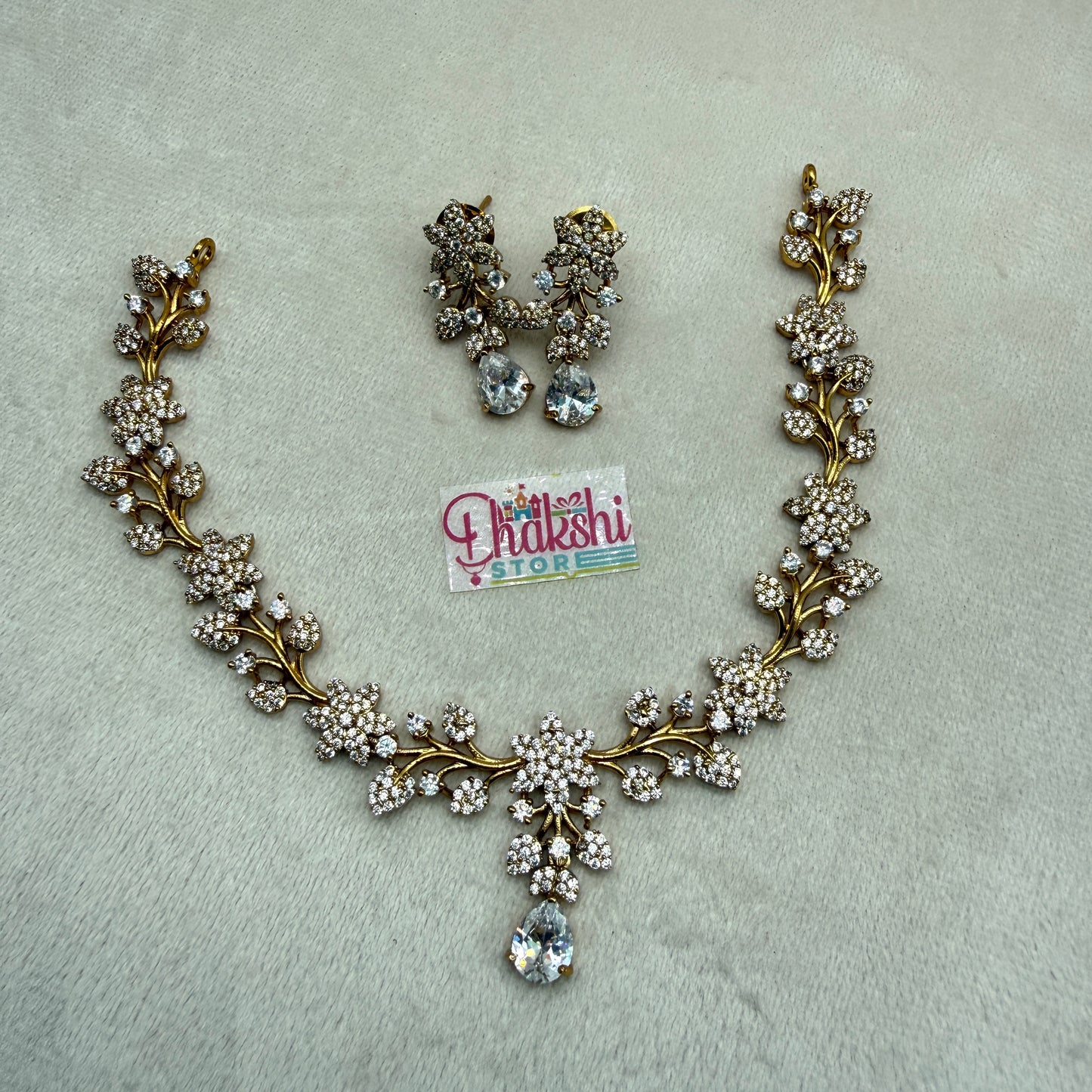 Elegant Floral Crystal Necklace Set – Gold Finish Designer Jewellery